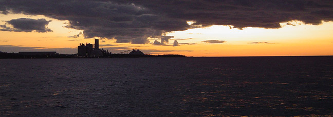 land and sea at sunset